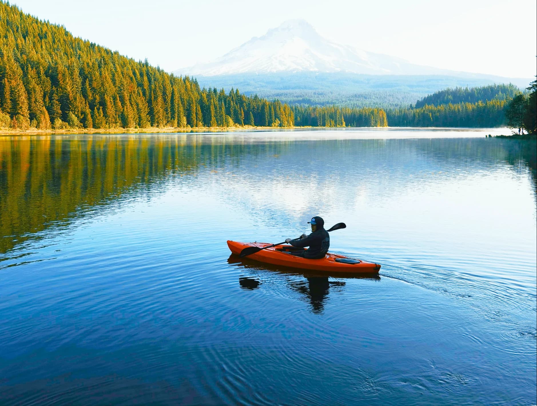 Kayaking on a mountain lake Kayaking on a mountain lake