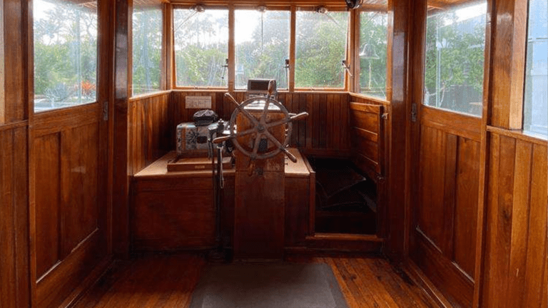 The ships wheel of Blue Mist sailing ship and wooden interior at Casa Morada Inn on Islamorada Florida